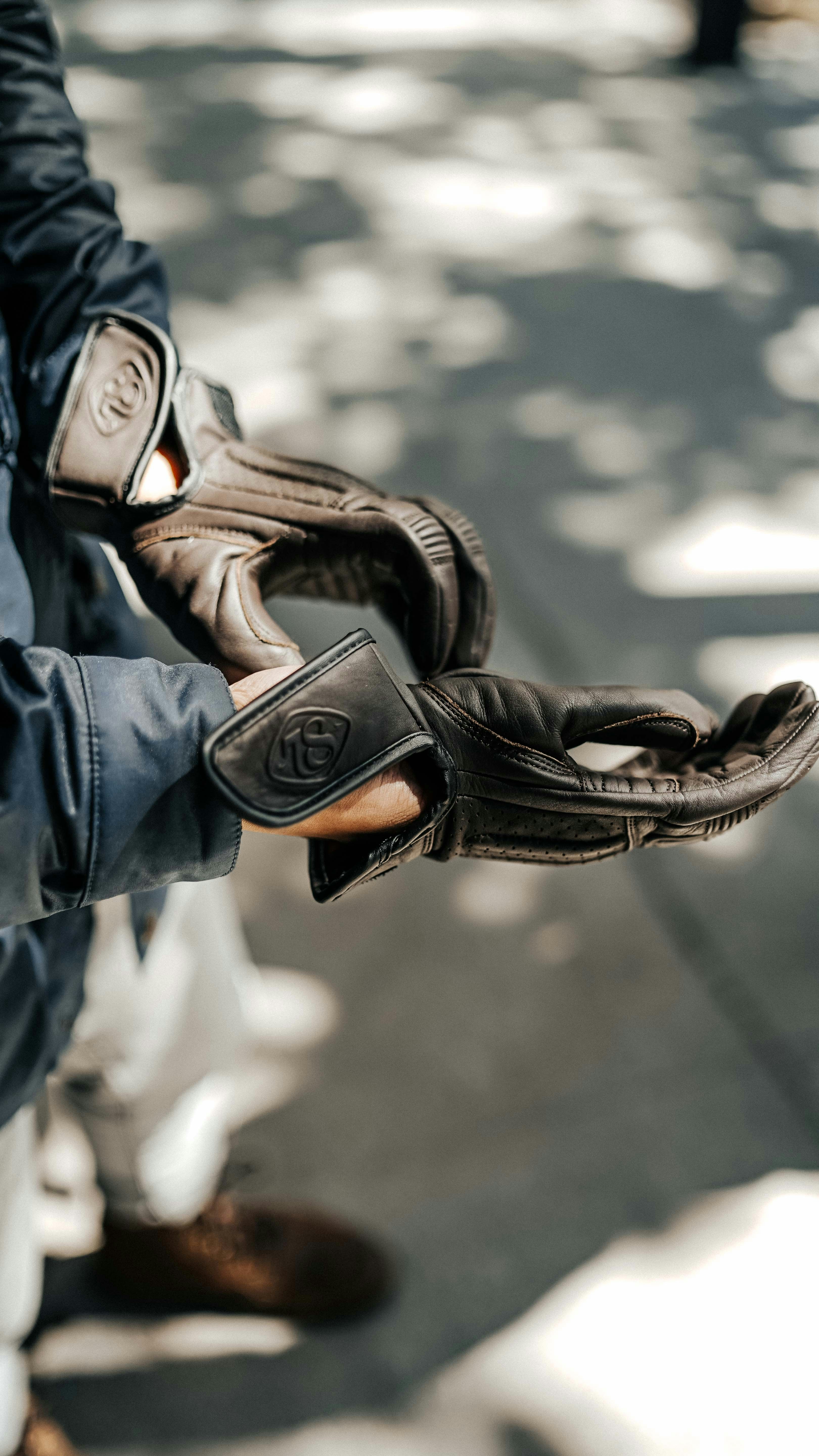 Pair of protective motorcycle gloves