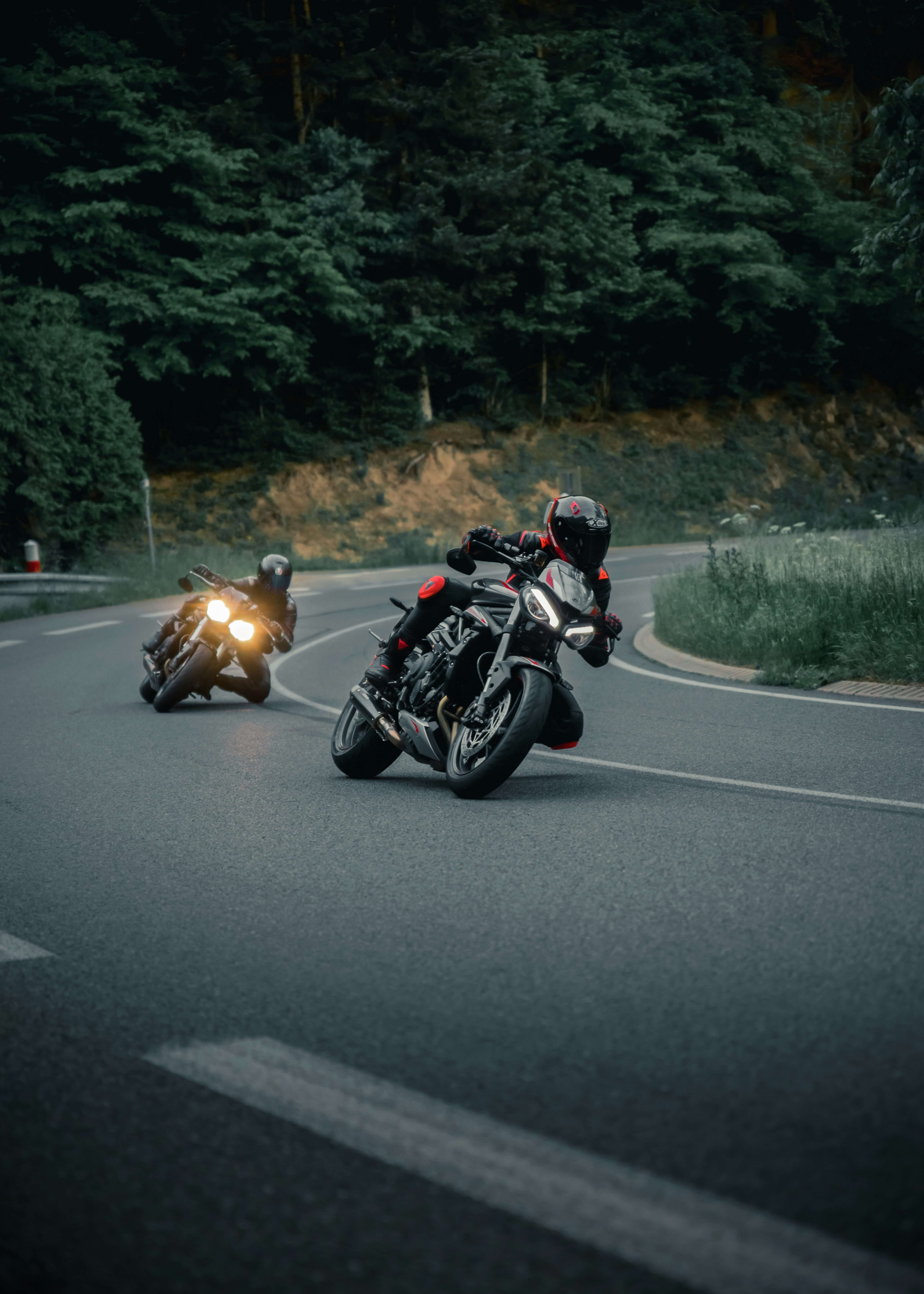 motorcycle rider taking a turn on the road