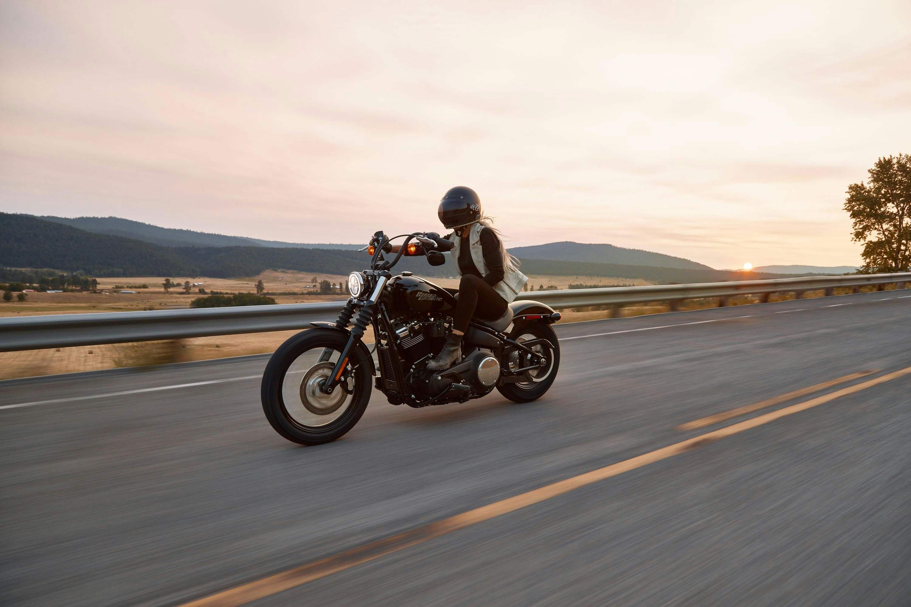 Motorcycle rider on an open road
